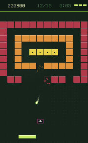 Une partie en cours : le mur en spirale du niveau CIBLE, une capsule de bonus qui tombe, la balle et la raquette.
